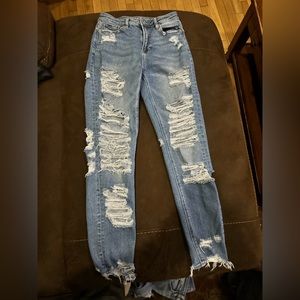 Women’s distressed American Eagle Mom jeans size 0.